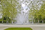 The Palais de la Nation seen in the opposite direction through Brussels
						Park.