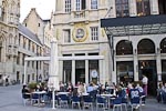 The Het Moorinneken, a restaurant facing the Grote Markt. &nbsp;The striking bust of an African slave over the entrance is no doubt a reference to Belgium's colony in the Congo in the early 20th century.