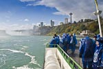 Our fellow passengers of the Maid of the Mist. &nbsp;The blue plastic "parkas" were issued when we got on board. &nbsp;We're prepared to get wet.