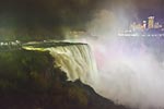 The American Falls at night. &nbsp;Lights from the Canadian side illuminate the falls.